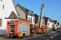 Feuer 3 Dachstuhlbrand Koeln Rath Heumar Gut Maarhausen Eilerstr P115